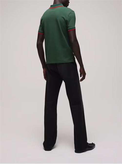 Polo con logo GUCCI | 872471XJHX63115